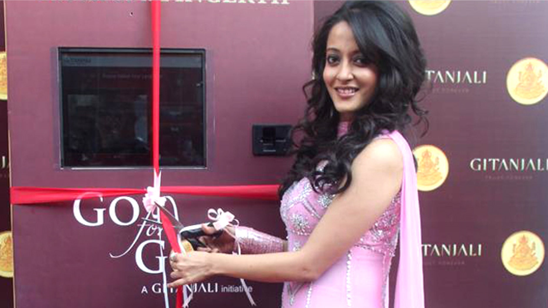 Oct. 22, 2011: An ATM that dispenses gold medallions, coins, diamonds, jewellery and more was opened for business by Bollywood star Raima Sen and Sanjeev Agarwal, CEO of manufacturer Gitanjali Export Corp.