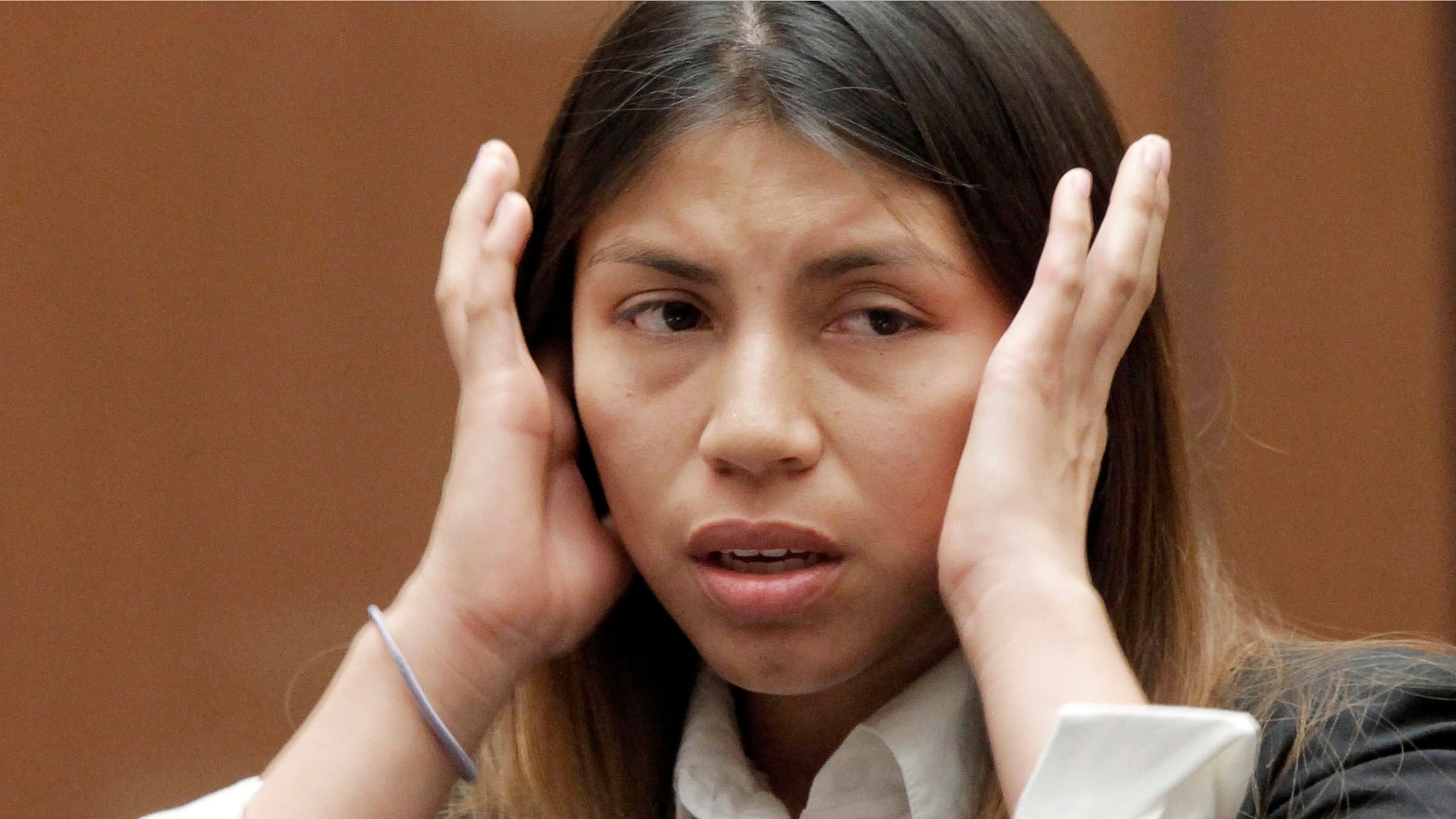 Diana Tamayo is shown in court as she faces burglary charges, Friday Oct. 19, 2012 in Los Angeles.