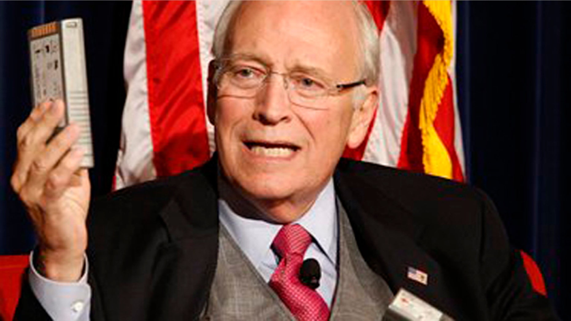Sept. 20, 2011: In this file photo, former Vice President Dick Cheney shows equipment for his heart pump while discussing his newly published book, In My Time - A Personal and Political Memoir, which is co-authored by his daughter Liz Cheney, at the Ronald Reagan Presidential Library and Museum in Simi Valley, Calif.