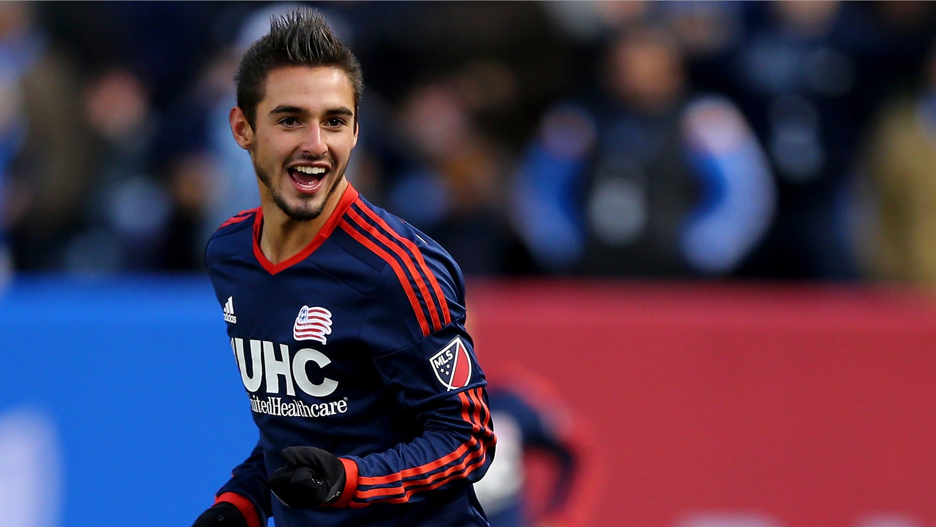 NEW YORK, NY - MARCH 15: Diego Fagundez #14 of New England Revolution reacts in the second half against the New York City FC during the inaugural game of the New York City FC at Yankee Stadium on March 15, 2015 in the Bronx borough of New York City.The New York City FC defeated the New England Revolution 2-0. (Photo by Elsa/Getty Images)