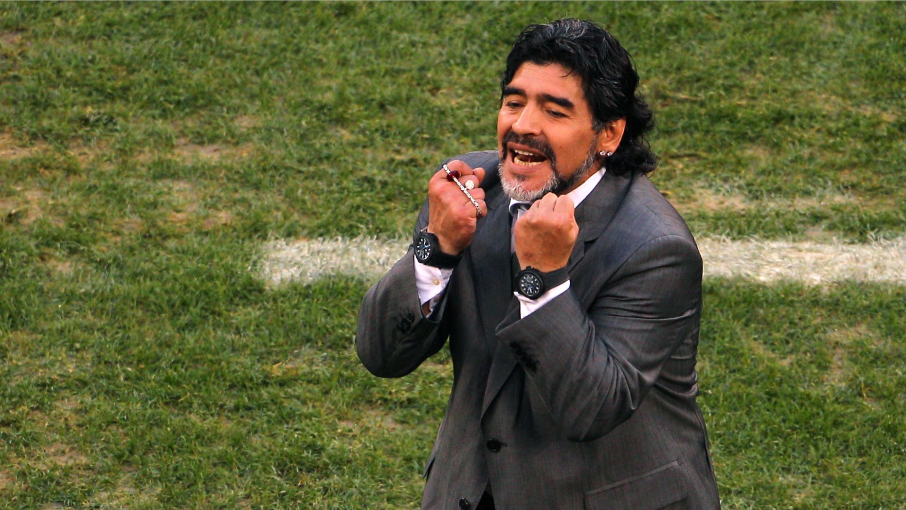 CAPE TOWN, SOUTH AFRICA - JULY 03: Diego Maradona head coach of Argentina gestures in frustration on the touchline during the 2010 FIFA World Cup South Africa Quarter Final match between Argentina and Germany at Green Point Stadium on July 3, 2010 in Cape Town, South Africa. (Photo by Clive Rose/Getty Images)