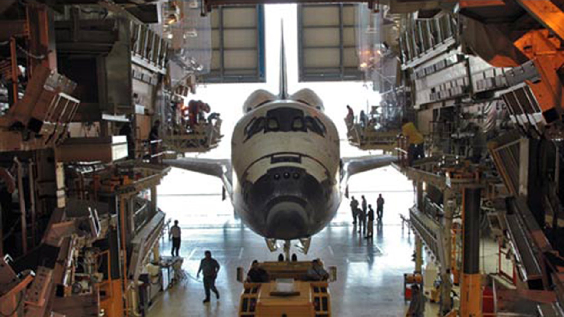 The space shuttle Discovery is shown inside its Orbital Processing Facility, a maintenance hangar used to service the spacecraft in between spaceflights, in this 2005 photo.