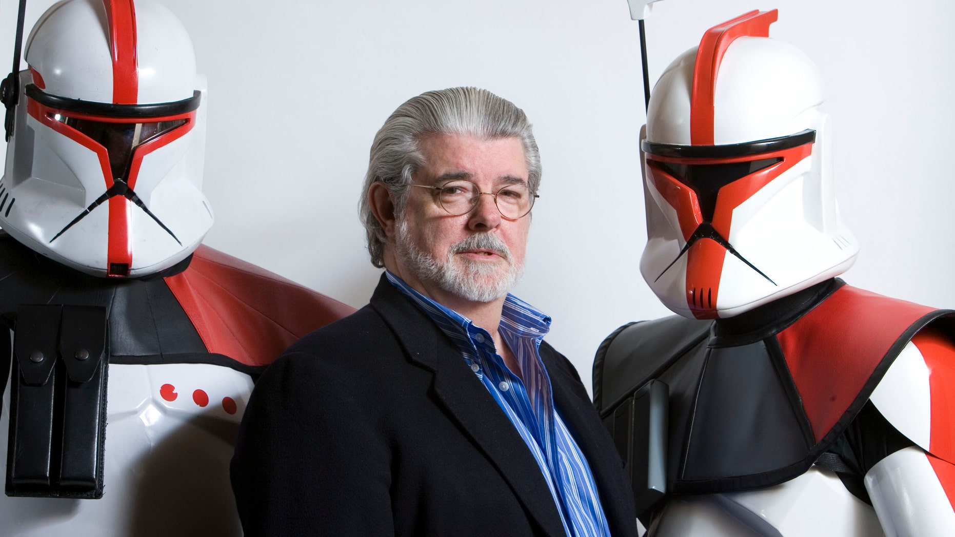 March 13, 2008: File photo, director/producer George Lucas poses for portrait in Las Vegas. Lucas wrote and produced the upcoming movie "Star Wars: The Clone Wars."Theres no mistaking the similarities.