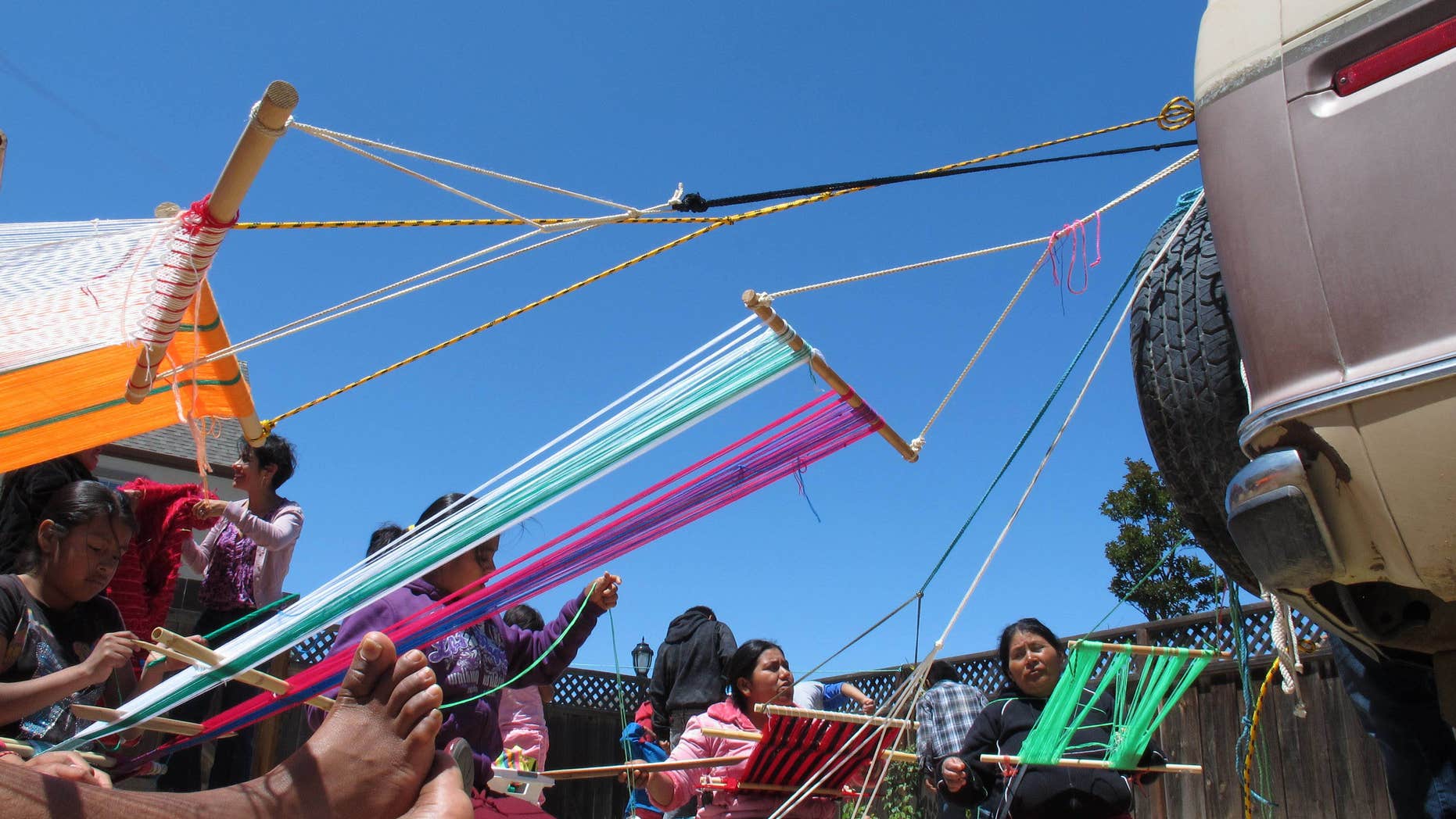 May 29: A group of women from the Mexican state of Oaxaca gather at a weaving workshop in Greenfield, California. Thousands of Trique, Mixtec and other Indians, the indigenous people of Mexico, have streamed in recent years from small mountain villages to Greenfield to plant and pick crops. Nearly all of Greenfield's 16,300 people are Latino - and yet an ugly conflict has been brewing between longer-time residents and newcomers.