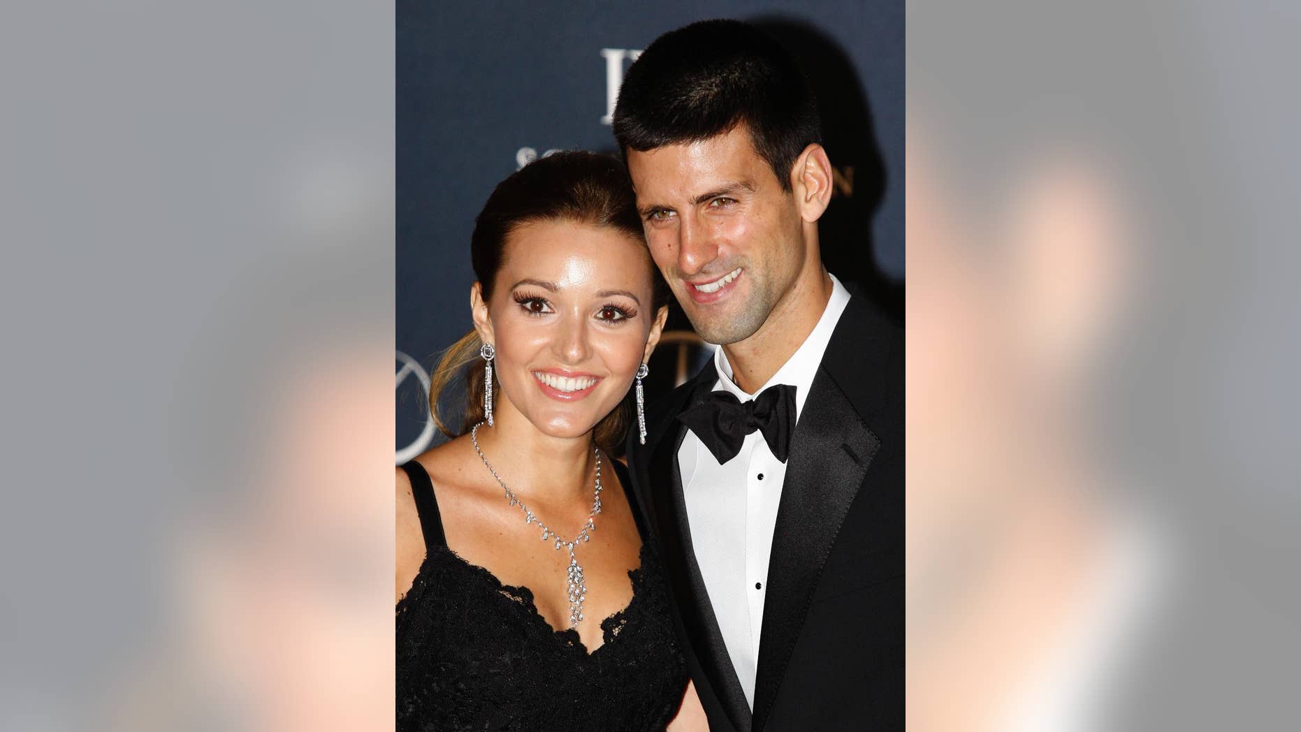 FILE - In this Feb. 6, 2012, file photo, tennis player Novak Djokovic, right, arrives with his then-girlfriend Jelena Ristic for the Laureus World Sports Awards in London. The top-ranked tennis player tweeted that he and his wife, Jelena, were celebrating the birth of their first child _ a boy named Stefan. "Stefan, our baby angel was born!" Djokovic posted on Twitter early Wednesday, Oct. 22, 2014. (AP Photo/Lefteris Pitarakis, File)