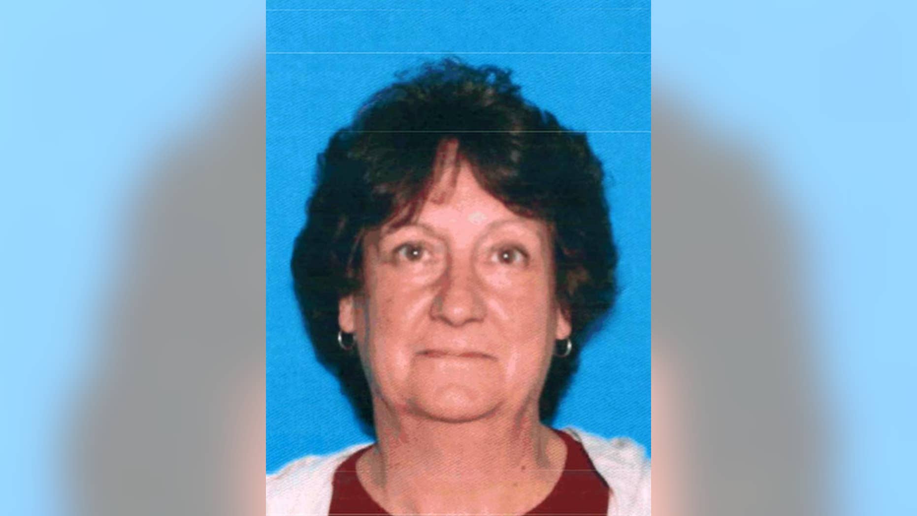 FILE - This Feb. 28, 2011, file photo shows the late Pamela Devitt in her California Department of Motor Vehicles license photo. Devitt , 63, was attacked Thursday, May 9, 2013, while jogging and mauled to death by four pit bulls in the high desert neighborhood of Littlerock in Palmdale, Calif. Alex Jackson, the dogs' owner was convicted of second-degree murder for the death of Devitt. Jackson was sentenced in Los Angeles County Superior Court to 15 years to life in prison Friday, Oct. 3, 2014, in Los Angeles. (AP Photo/Department of Motor Vehicles, File)