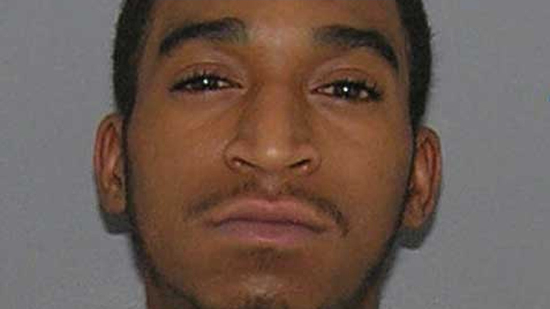 Dominic Gaines was arrested shortly after police say he posted a photo of himself holding his 1-year-old daughter and a BB gun.