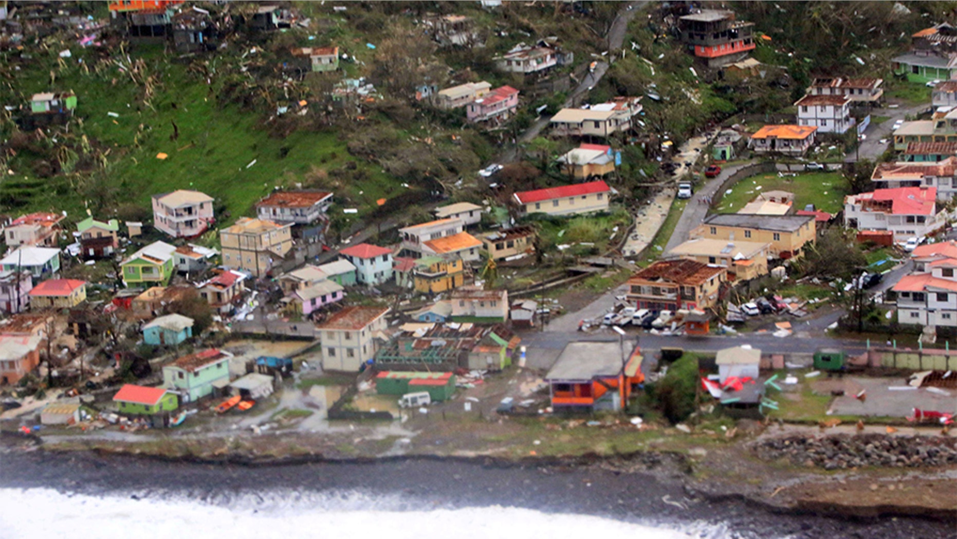 Damaged homes from Hurricane Maria are seen in an aerial photo taken over Dominica.