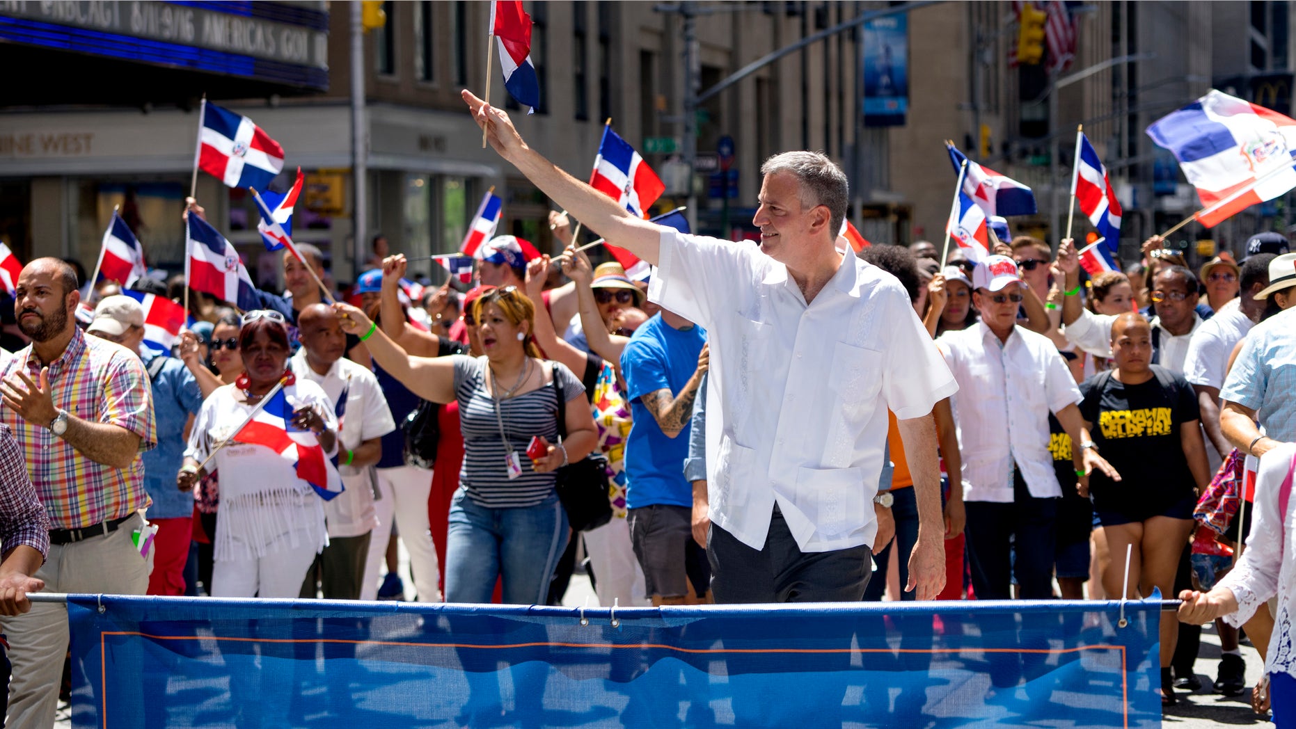 New York City Mayor Bill de Blasio walks in the Dominican Day Parade Sunday, Aug. 9, 2015, in New York.