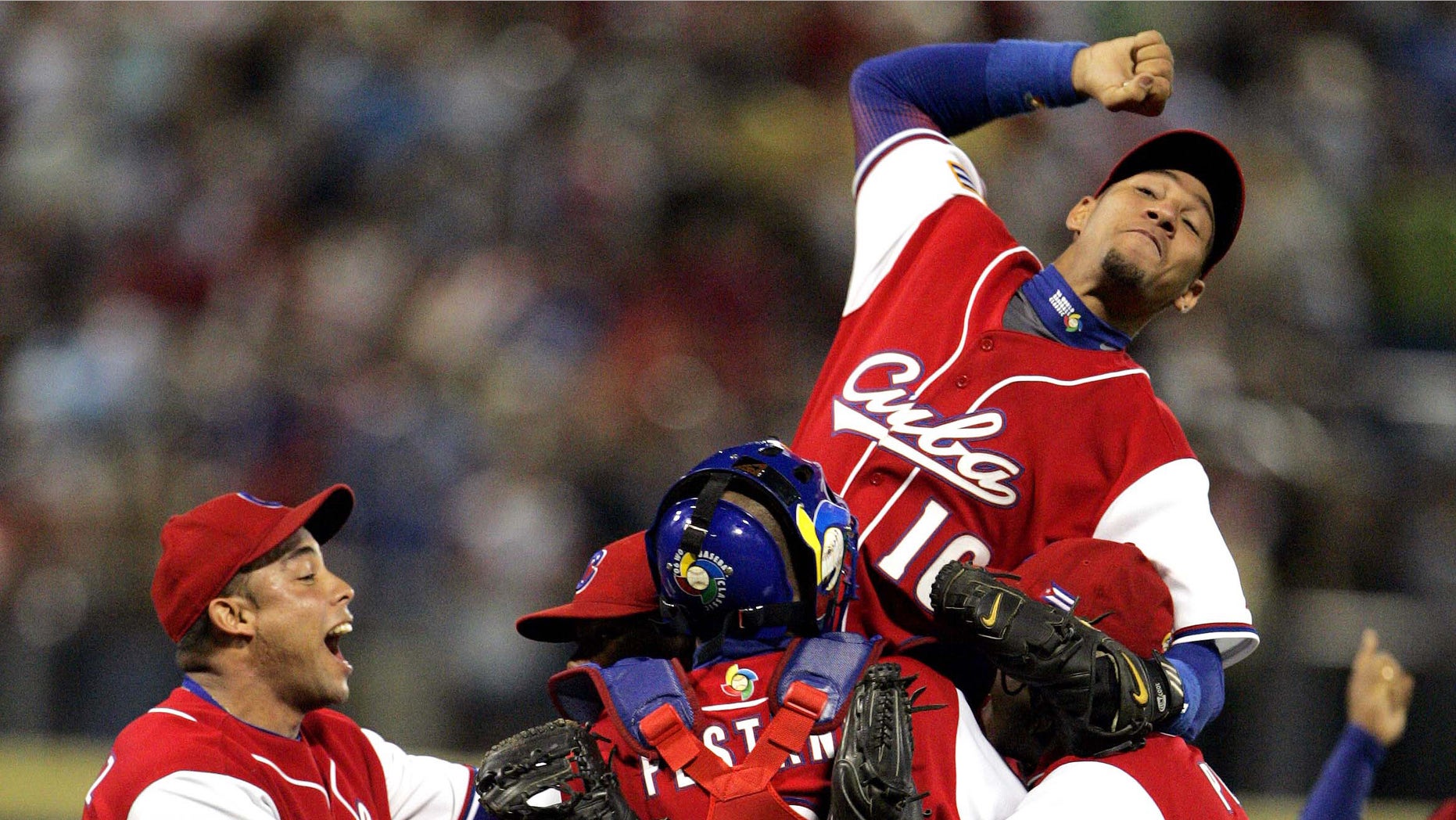 Yulieski Gourriel celebrates with his teammates in a 2006 file photo.