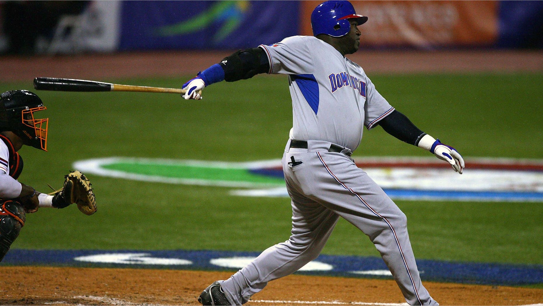 SAN JUAN, PUERTO RICO - MARCH 10: David Ortiz #34 of the Dominican Republic hits a double against the Netherlands during the 2009 World Baseball Classic Pool D match at Hiram Bithorn Stadium March 10, 2009 in San Juan, Puerto Rico. (Photo by Al Bello/Getty Images)