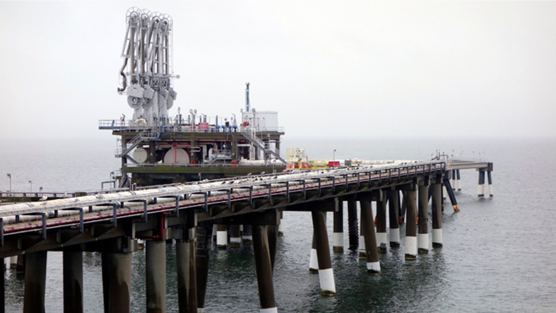 FILE: Feb. 5, 2014: The pier at Dominion's Cove Point liquefied natural gas plant on Maryland's Chesapeake Bay.