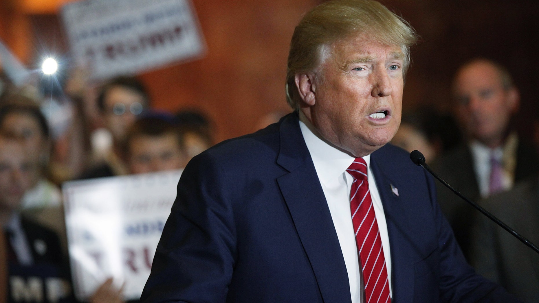 NEW YORK, NY - SEPTEMBER 03: GOP presidential front-runner Donald Trump speaks at a news conference in Manhattan after he signed a pledge Thursday to support the Republican nominee in the 2016 general election, ruling out a third-party or independent run on September 3, 2015 in New York City. Trump made the announcement following a meeting with Republican National Committee chairman Reince Priebus. Trump stressed repeatedly in the news conference that he is leading in all national polls. (Photo by Spencer Platt/Getty Images)