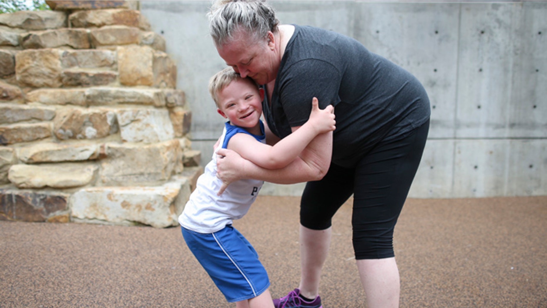 July 7, 2015: In this photo, Steven Heffron, 6, and his mother, Denise Watts, play in Smale Riverfront Park in downtown Cincinnati.