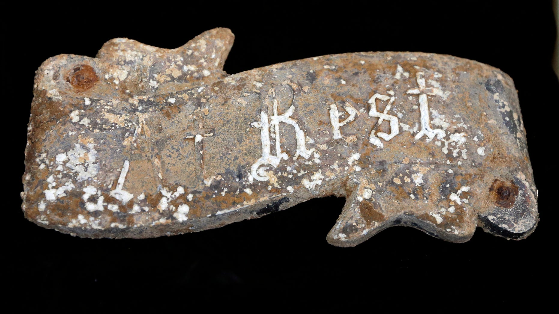 Jan. 28, 2014: Artifacts from a coffin found in a grave at the Arthur G. Dozier School for Boys in Marianna, Fla., are shown during news conference at the University of South Florida in Tampa.