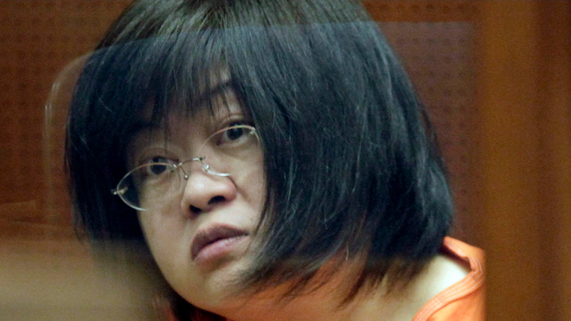 March 16, 2012: Dr Hsiu Ying "Lisa" Tseng listens in court during her arraignment, in Los Angeles.