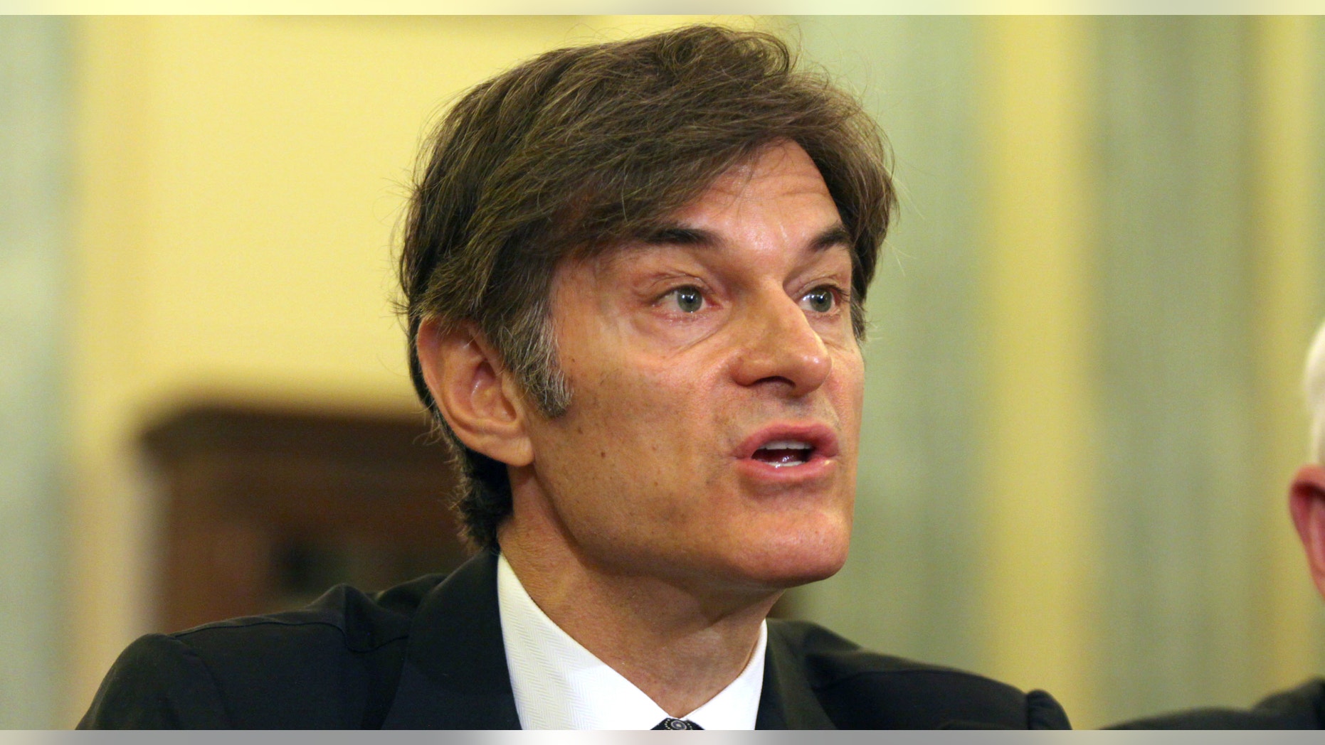 Dr. Mehmet C. Oz, chairman and professor of surgery, Columbia University College of Physicians and Surgeons, testifies on Capitol Hill in Washington before the Senate subcommittee on Consumer Protection, Product Safety, and Insurance hearing to examine protecting consumers from false and deceptive advertising of weight-loss products.