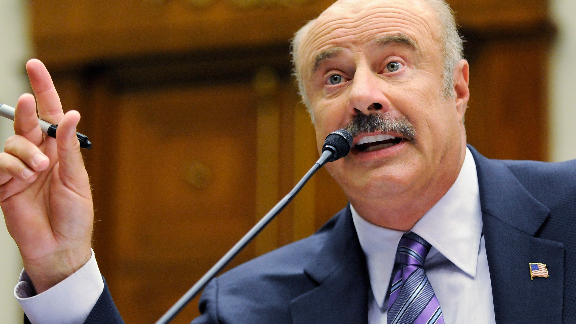 Dr. Phil McGraw, television personality and psychologist, talks about cyber-bullying during a hearing of the Healthy Families and Communities Subcommittee of the U.S. House Committee on Education and Labor, on Capitol Hill in Washington, June 24, 2010.
