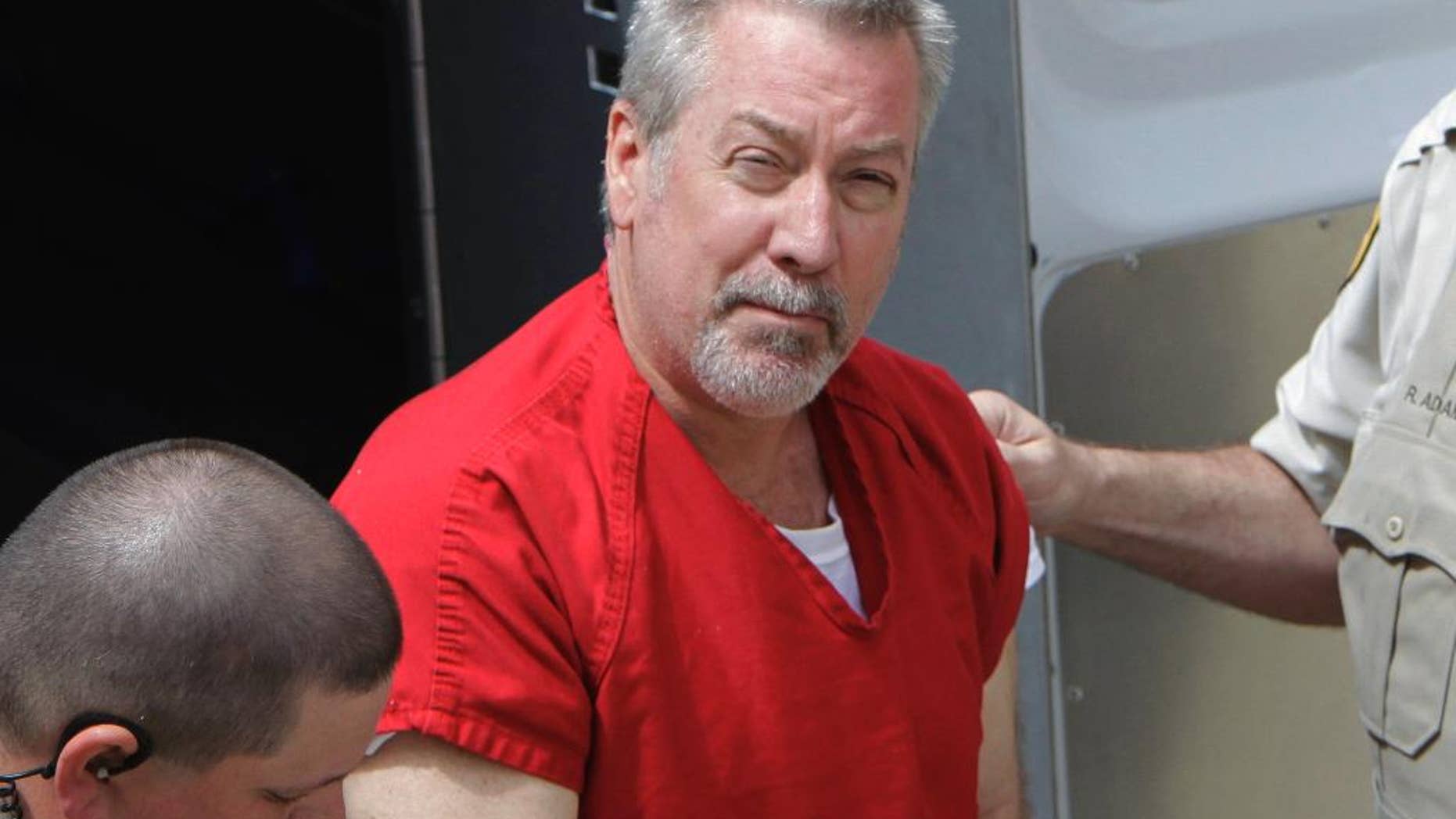 Drew Peterson to stand trial in July on charges of plotting to kill