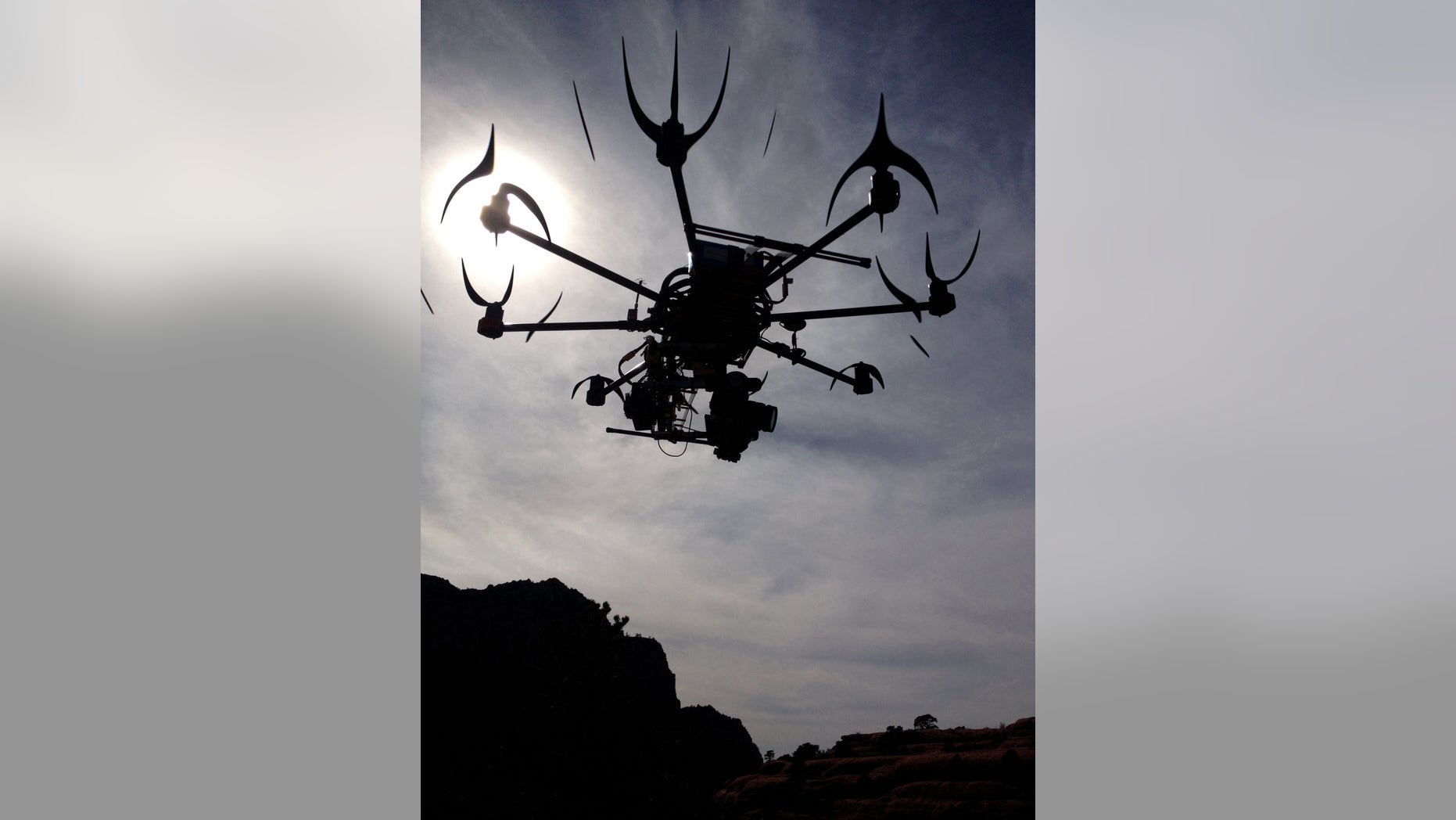 File photo - This image provided by Aerial MOB, LLC, shows their eight rotor Sky Jib Helicopter in San Diego, Calif., in August 2013.