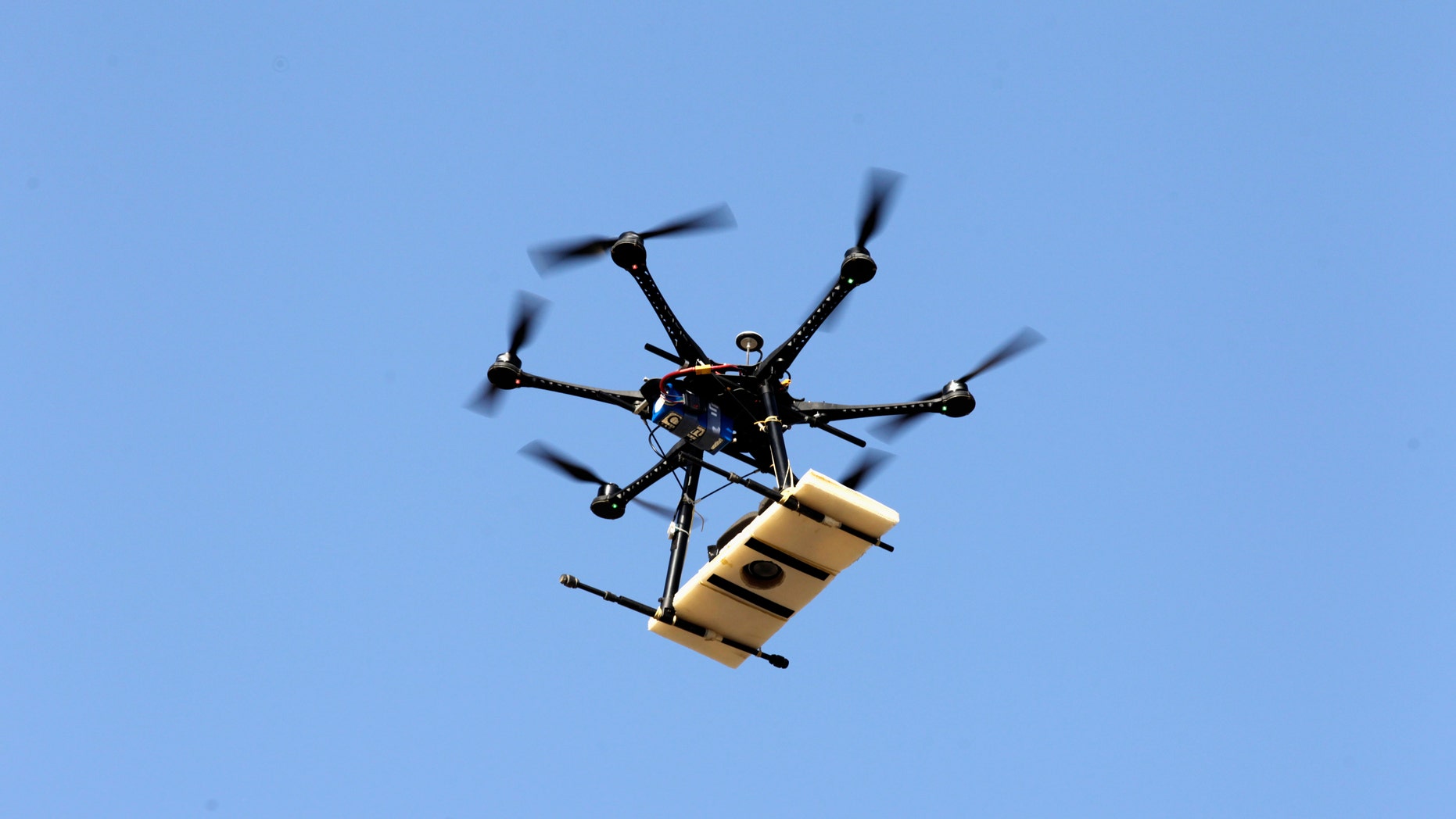 A drone flies over the archaeological site of Cerro Chepen as it takes pictures in Trujillo, Peru. There are several ways in which drones are being used outside of military applications.
