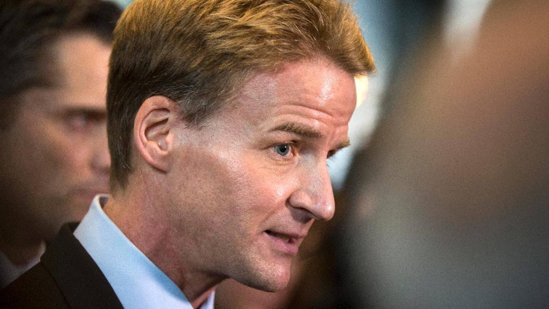 FILE - U.S. Attorney Zachary Fardon speaks to reporters after the sentencing of Beanie Babies creator H. Ty Warner in this Tuesday, Jan. 14, 2014 file photo, at the federal building in Chicago. Prosecutors in Chicago in January 2015 have quietly dropped dozens of serious narcotics conspiracy charges stemming from stings involving fictional drug stash houses. Fardon’s office dropped the charges for 27 out of the 33 suspects in which defendants were arrested for allegedly attempting to steal drugs from stash houses that never existed. (AP Photo/Andrew A. Nelles, File)