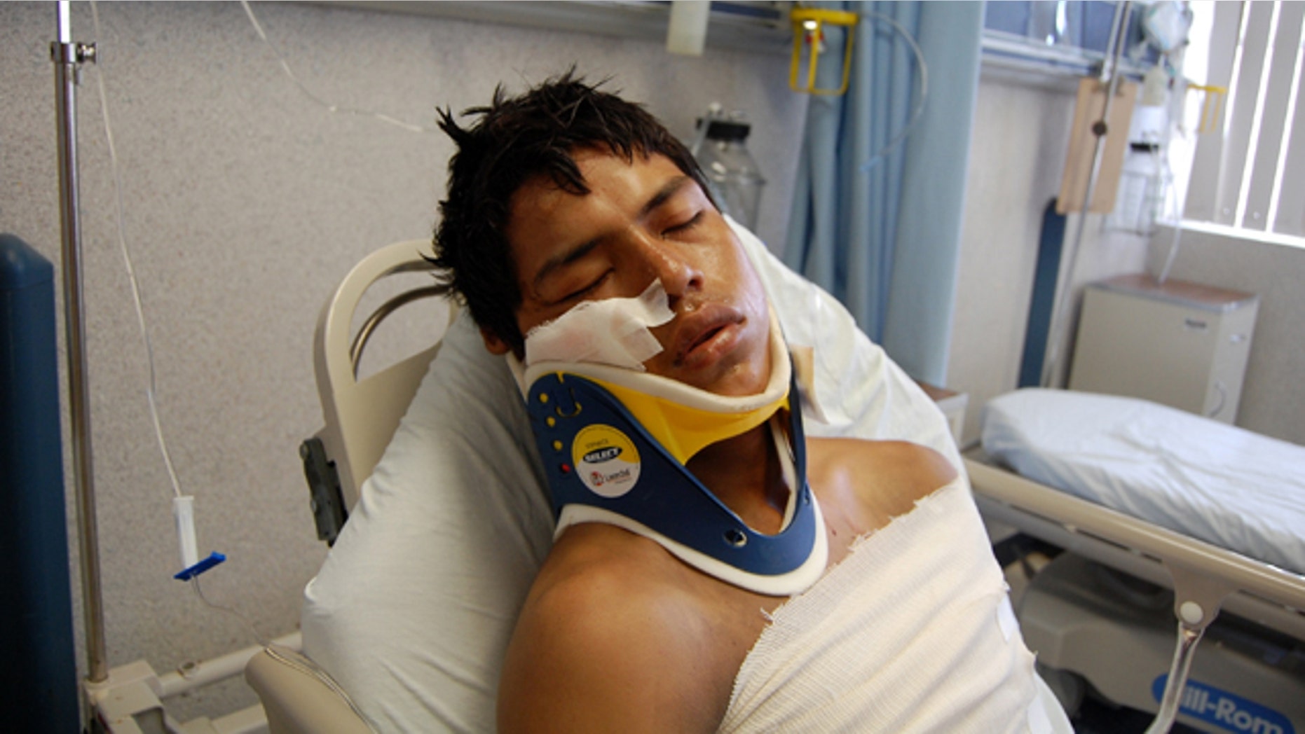 Aug. 24, 2010: Luis Fredy Lala Pomavilla of Ecuador rests at a hospital in eastern Mexico after surviving a drug cartel massacre that killed 72 Central and South American migrants.