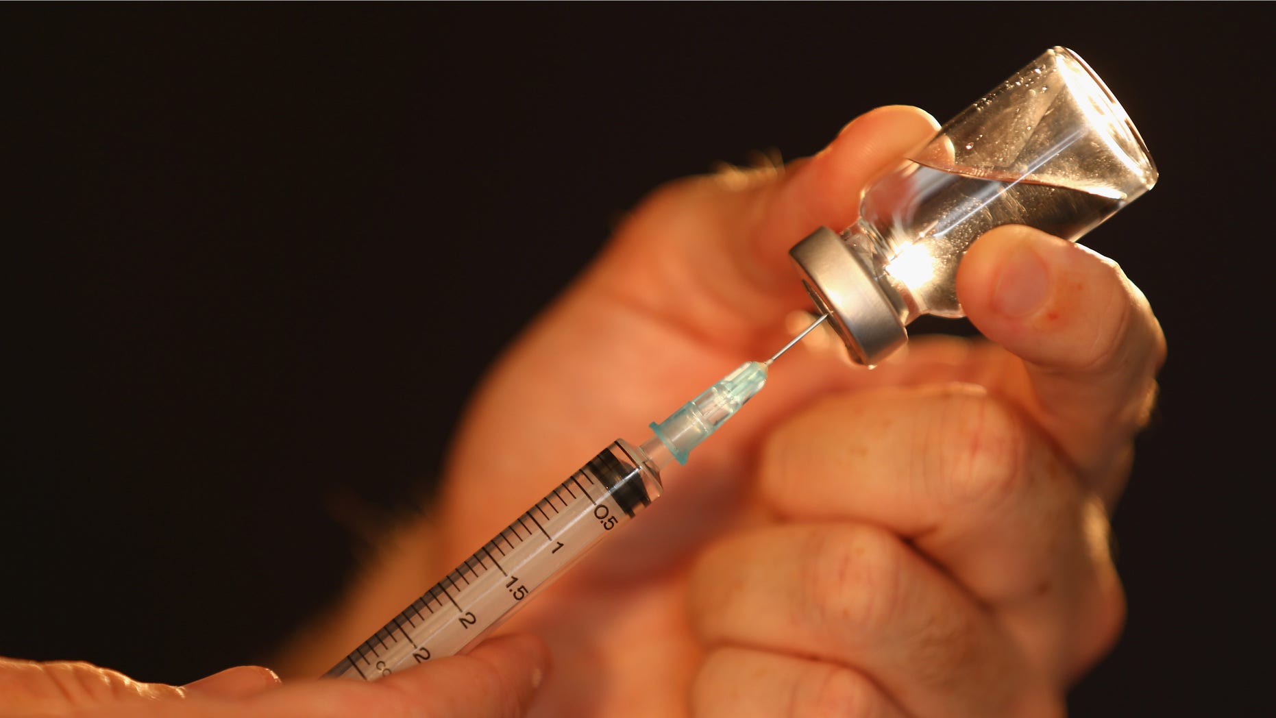 MELBOURNE, AUSTRALIA - FEBRUARY 21: Liquid is extraced from a medical vial with a syringe on February 21, 2013 in Melbourne, Australia. The Australian Crime Commission on Thursday released findings from a 12 month investigation into Australian sport, uncovering the possibility of match fixing, drugs in sport and links to organised crime. (Photo by Robert Cianflone/Getty Images)