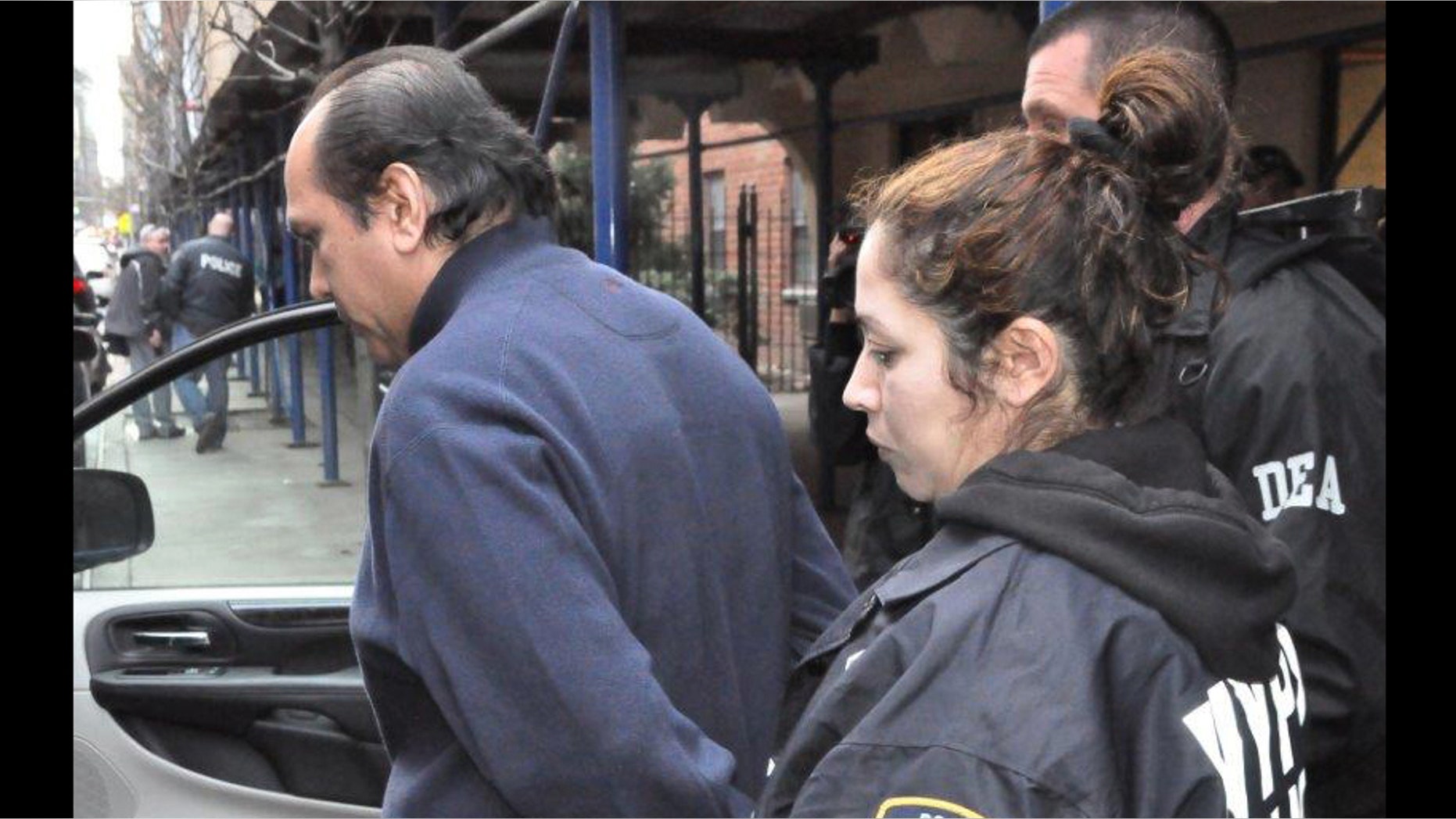 Dr. Hector Castro being arrested.
