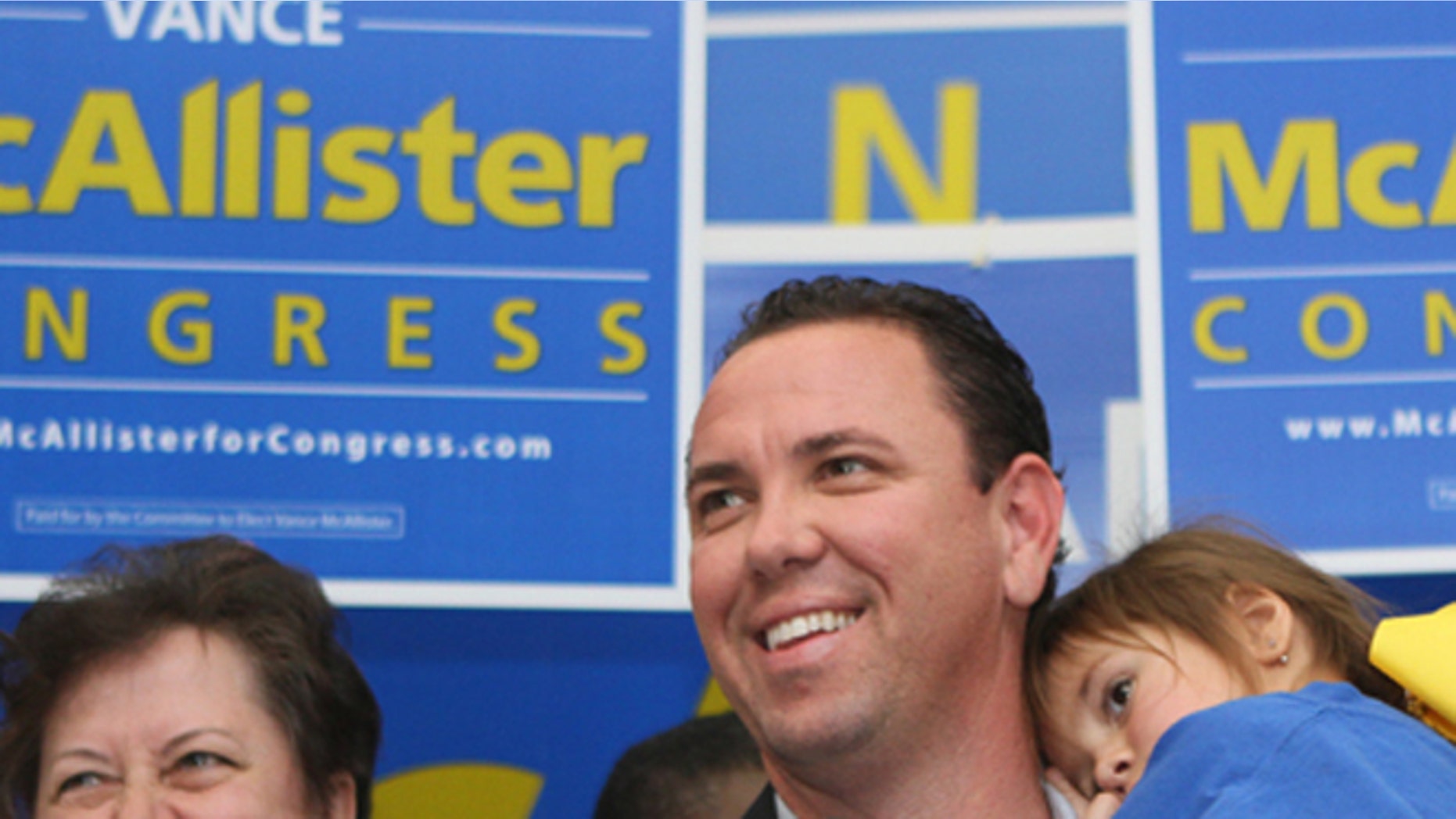 FILE: Sat., Nov. 16, 2013: Republican Vance McAllister celebrates with his family and supporters after winning a congressional district election in Louisiana.