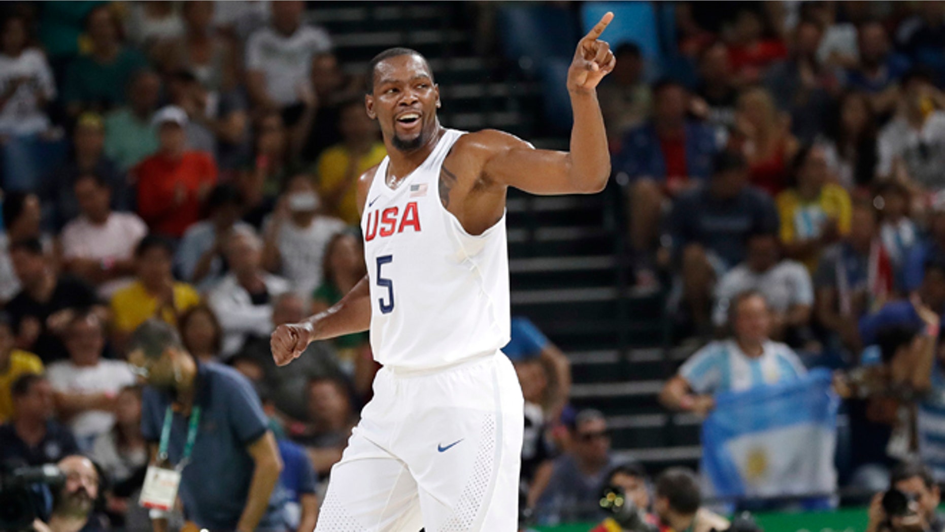 United States' Kevin Durant (5) signals to teammates after he scored against Argentina during a men's quarterfinal round basketball game at the 2016 Summer Olympics in Rio de Janeiro, Brazil, Wednesday, Aug. 17, 2016. (AP Photo/Eric Gay)