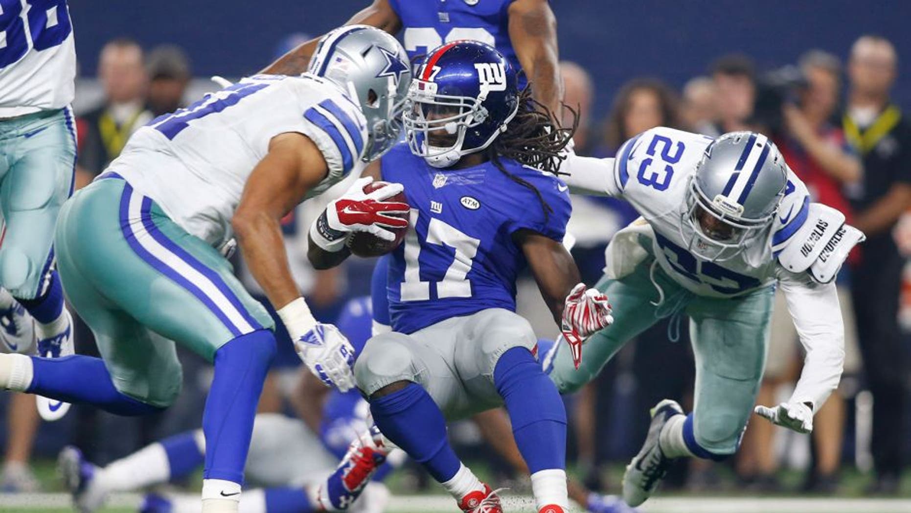 Sep 13, 2015; Arlington, TX, USA; New York Giants wide receiver Dwayne Harris (17) is tackled by Dallas Cowboys defensive back Corey White (23) int he fourth quarter at AT&T Stadium. The Cowboys won 27-26. Mandatory Credit: Tim Heitman-USA TODAY Sports