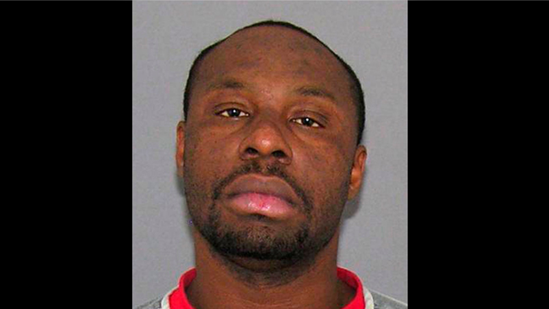 This undated file photo provided by the Hamilton County Sheriff's Department shows Ricardo Woods, of Cincinnati. Woods was found guilty Thursday, May 16, 2013, in the shooting death of a man who authorities say identified his assailant by blinking his eyes while paralyzed and hooked up to a ventilator.