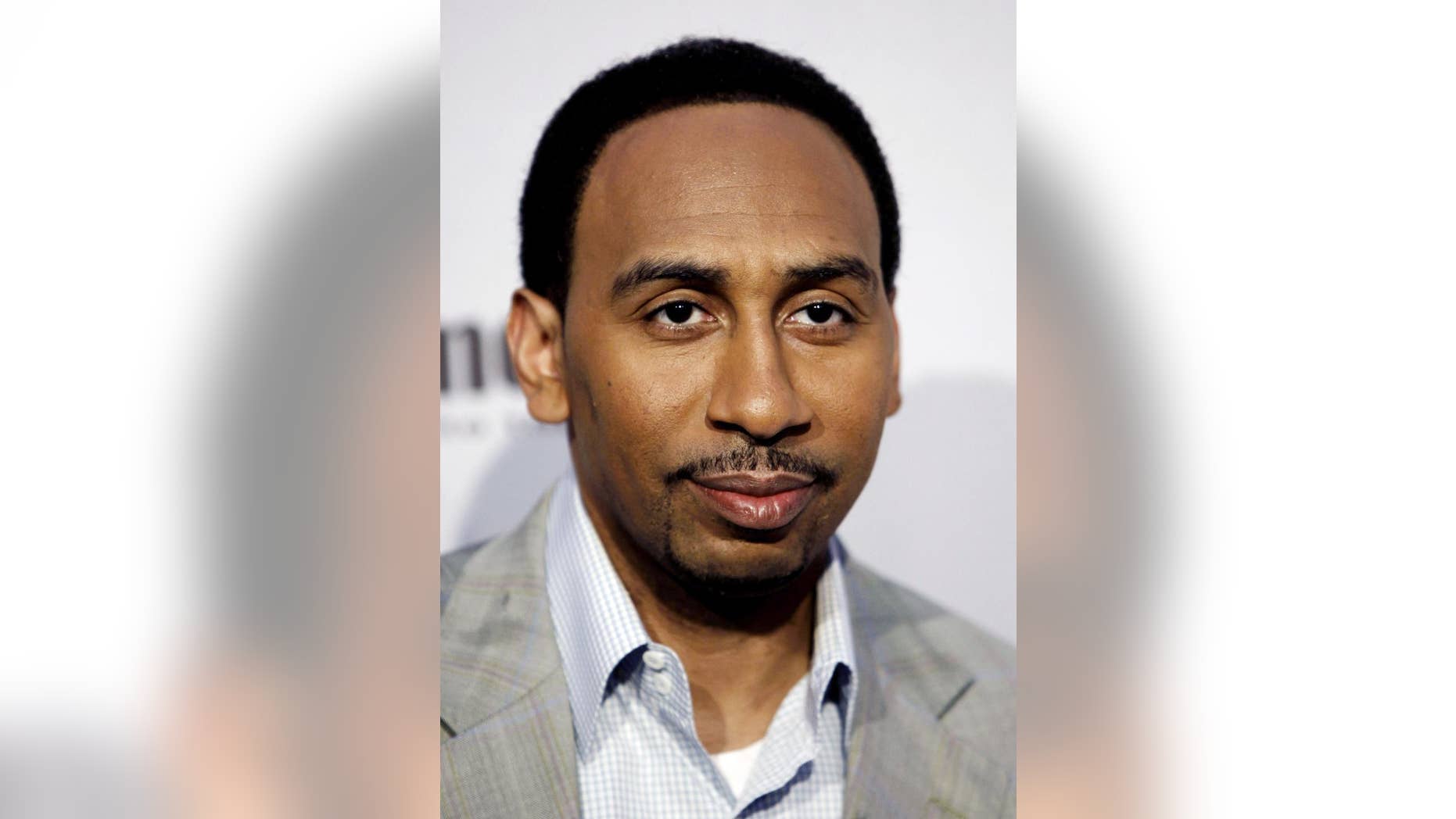 FILE - In this Saturday, Dec. 12, 2009 file photo, Stephen A. Smith arrives at Spike TV's Video Game Awards in Los Angeles. ESPN says it has suspended sportscaster Stephen A. Smith, Tuesday, July 29, 2014 for a week because of comments about domestic abuse suggesting women should make sure they don't provoke attacks. (AP Photo/Matt Sayles, File)