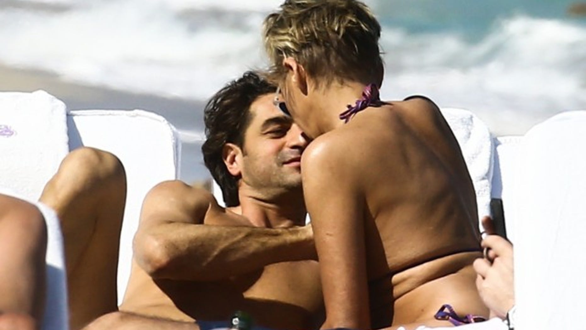 Sharon Stone and her boyfriend enjoy a date on the beach.