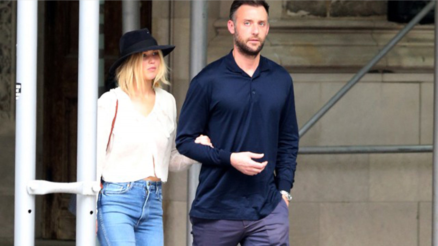 Jennifer Lawrence, left, and her boyfriend Cooke Maroney walked arm-in-arm in New York City.