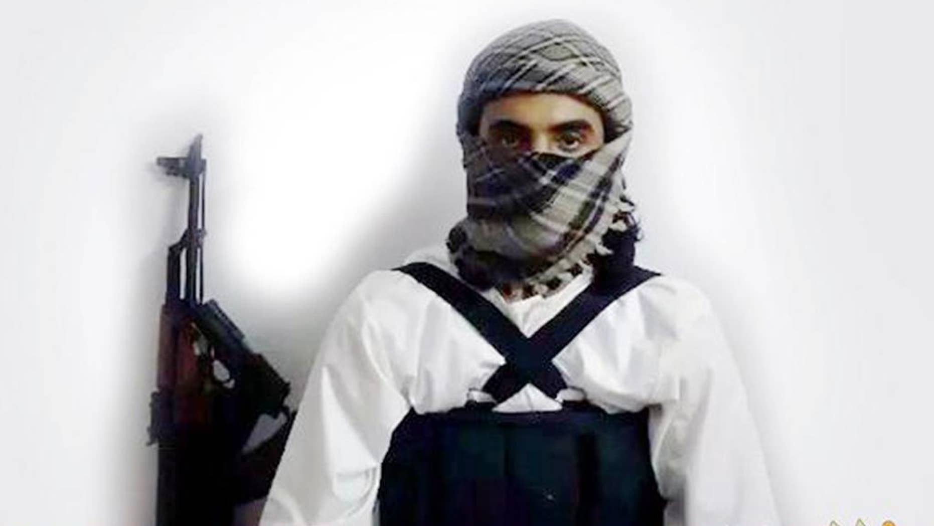 FILE - This file image taken from a militant website associated with Islamic State extremists, posted Saturday, May 23, 2015, purports to show a suicide bomber, with the Arabic bar below reading: "Urgent: The heroic martyr Abu Amer al-Najdi, the attacker of the (Shiite) temple in Qatif", which the Islamic State group's radio station claimed responsibility for. Al-Bayan, the Islamic State radio targeting potential European recruits, touts recent triumphs in the campaign to carve out a Caliphate with contrast between the smooth, Western-style production and the extremist content showing how far the hardcore Islamic propaganda machine has come since its beginnings in 2012. (Militant photo via AP, FILE)