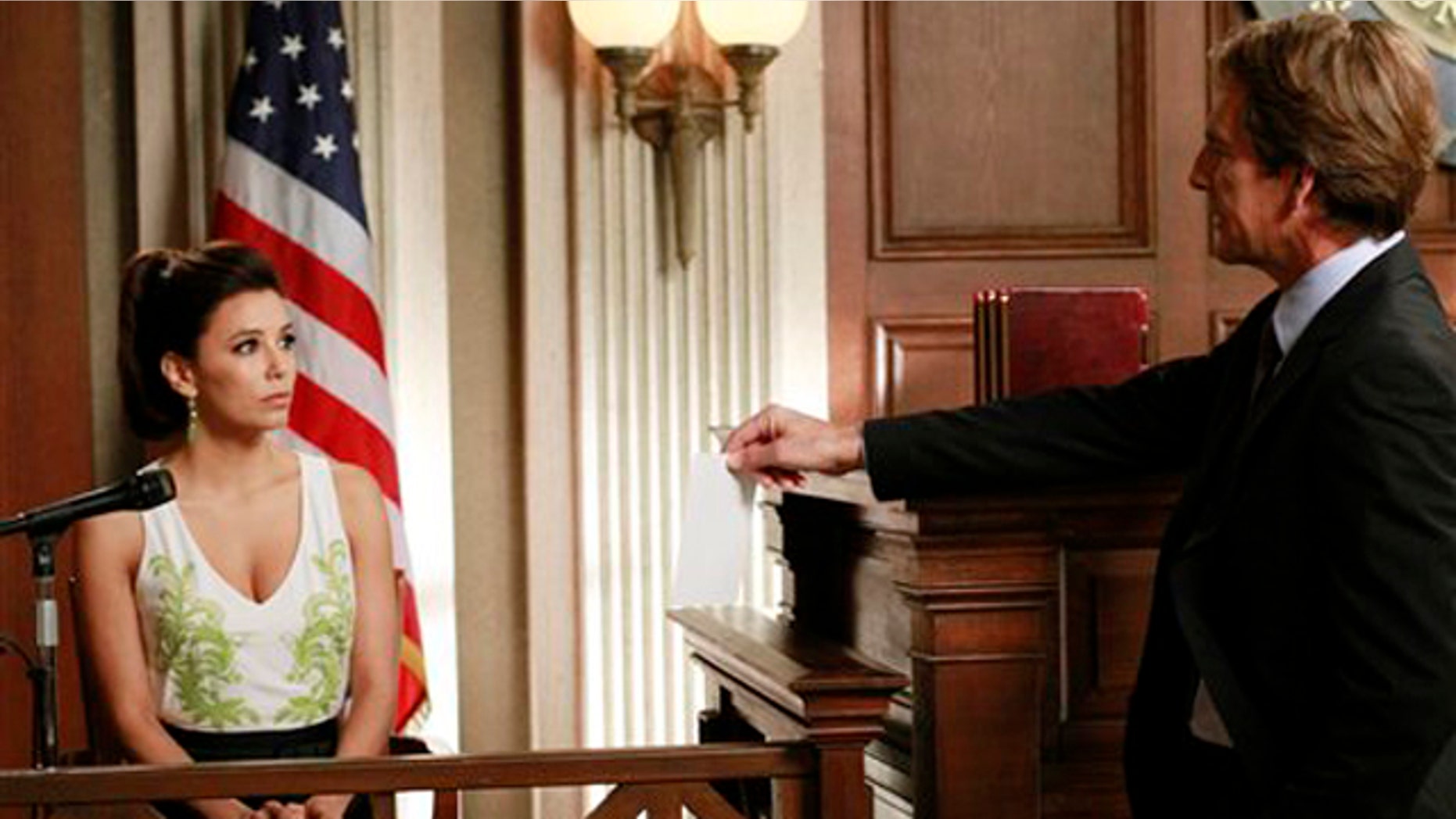 May 13, 2012: Eva Longoria, left, and Scott Bakula are shown in a scene from the series finale of 'Desperate Housewives,' that was aired on Sunday.