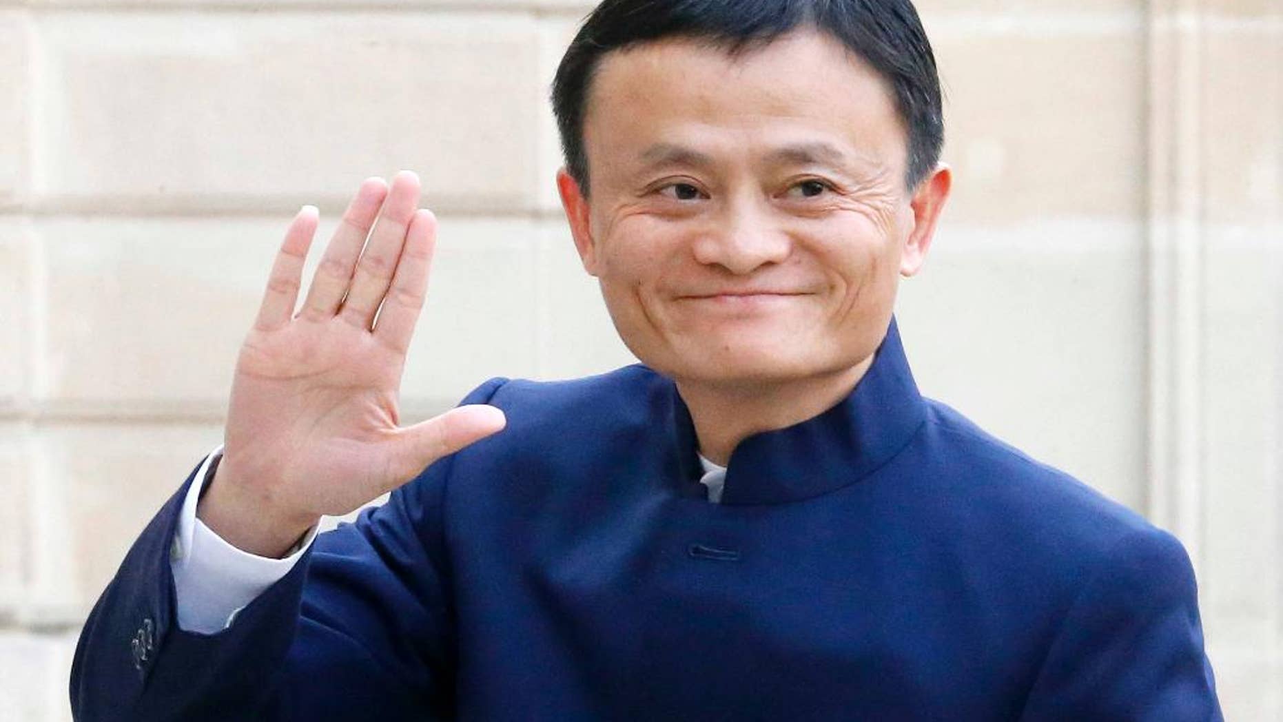 FILE - In this March 18, 2015 file photo, Jack Ma, founder and CEO of the Alibaba Group, arrives at the Elysee Palace, in Paris. Alibaba reports quarterly financial results on Thursday, May 7, 2015. (AP Photo/Jacques Brinon, File)
