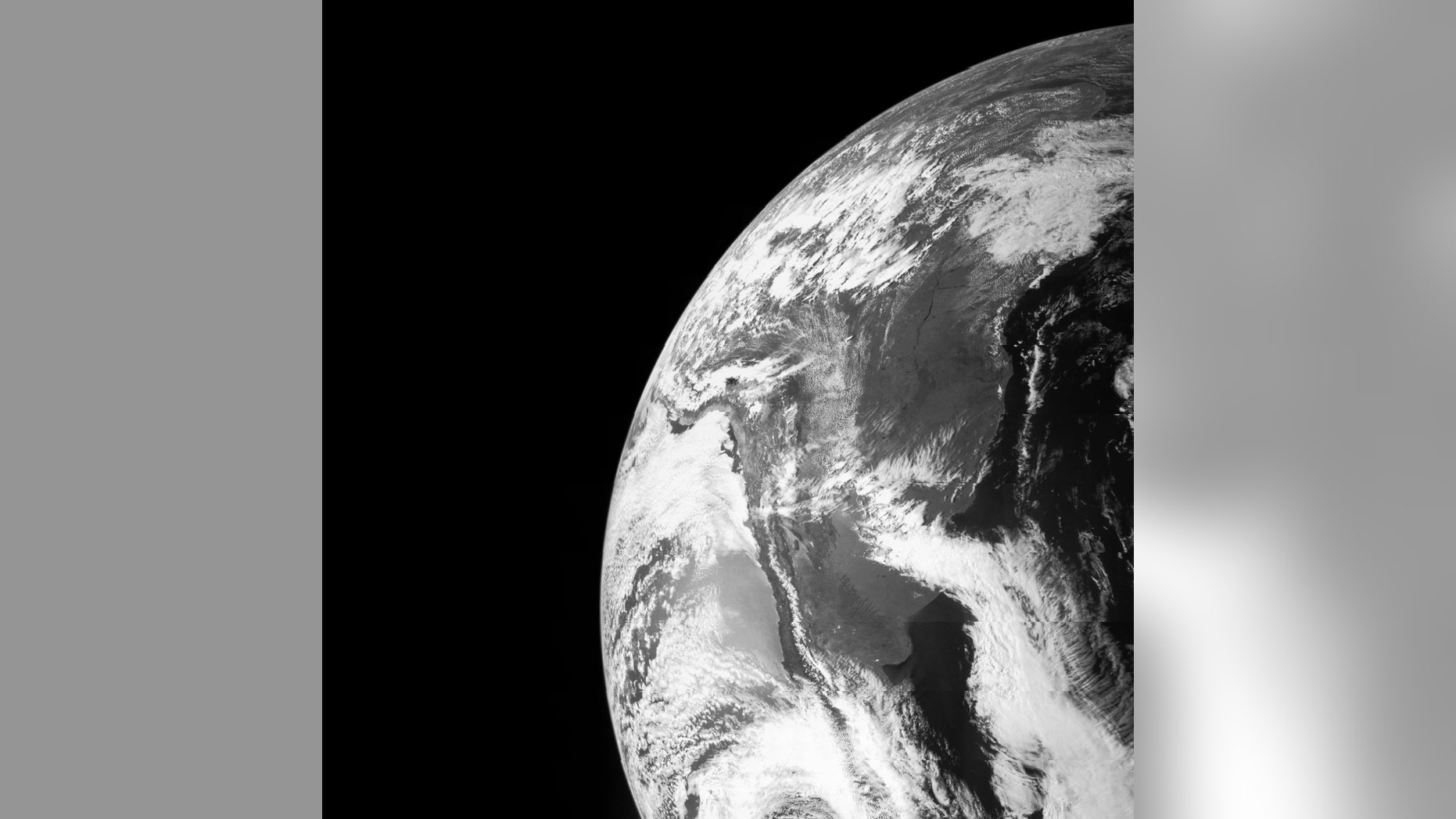 Earth is seen in this image taken by NASA's JunoCam as it flew by Earth, using its gravity to get a boost needed to reach Jupiter on October 9, 2013, in this NASA handout image released to Reuters.