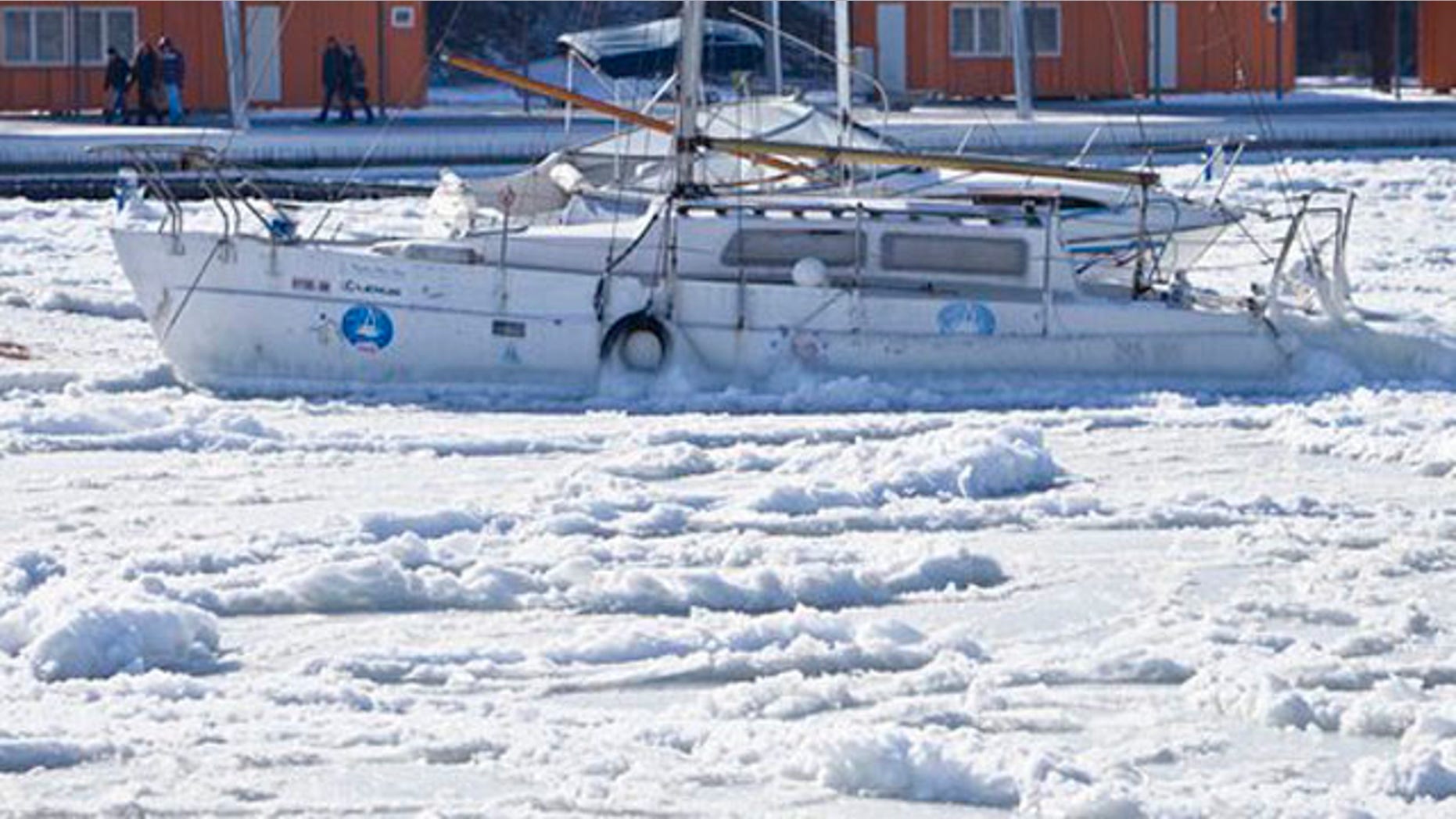 Feb. 2, 2012: Ice engulfs a boat as the Black Sea is frozen near the shore in Constanta, Romania.