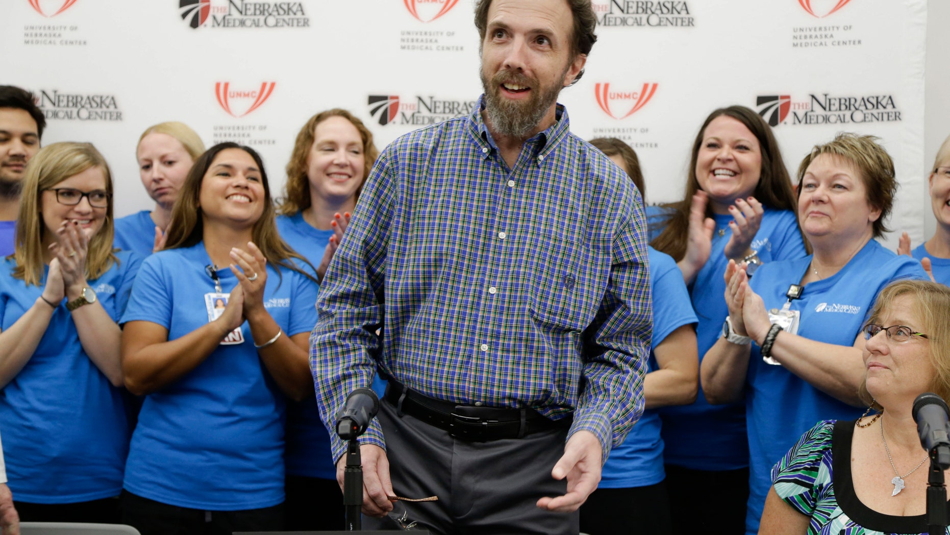Sept. 25, 2014: Former Ebola patient Dr. Richard Sacra arrives to a news conference at the Nebraska Medical Center in Omaha, Neb.