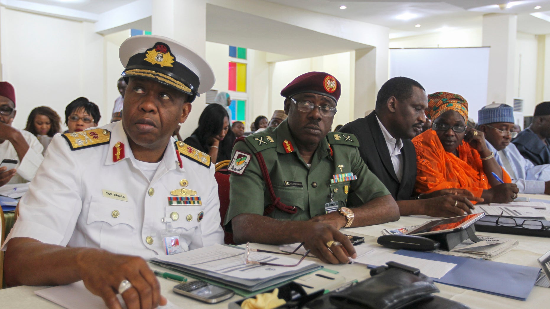 Nigerian navy and military medical directors attend the second general meeting with Nigeria's Health Minister Onyebuchi Chukwu (not pictured) during a media briefing on updates regarding the ongoing national Ebola disease outbreak, in Abuja September 1, 2014. REUTERS/Afolabi Sotunde