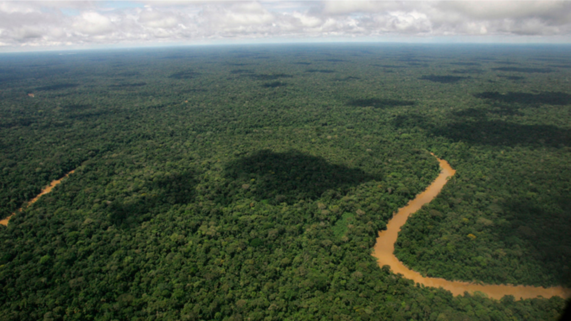 FILE - This May 17, 2007 file photo shows an aerial view of Yasuni National Park in Ecuador's northeastern jungle. Lawmakers on Thursday, Oct. 3, 2013 authorized the extraction of oil from Yasuni National Park, a pristine Amazon reserve. (AP Photo/Dolores Ochoa, File)