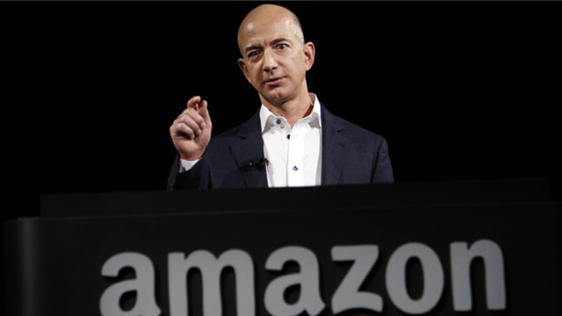 File- This Sept. 6, 2012, file photo shows Jeff Bezos, CEO and founder of Amazon, at the introduction of the new Amazon Kindle Fire HD and Kindle Paperwhite personal devices, in Santa Monica, Calif. (AP)