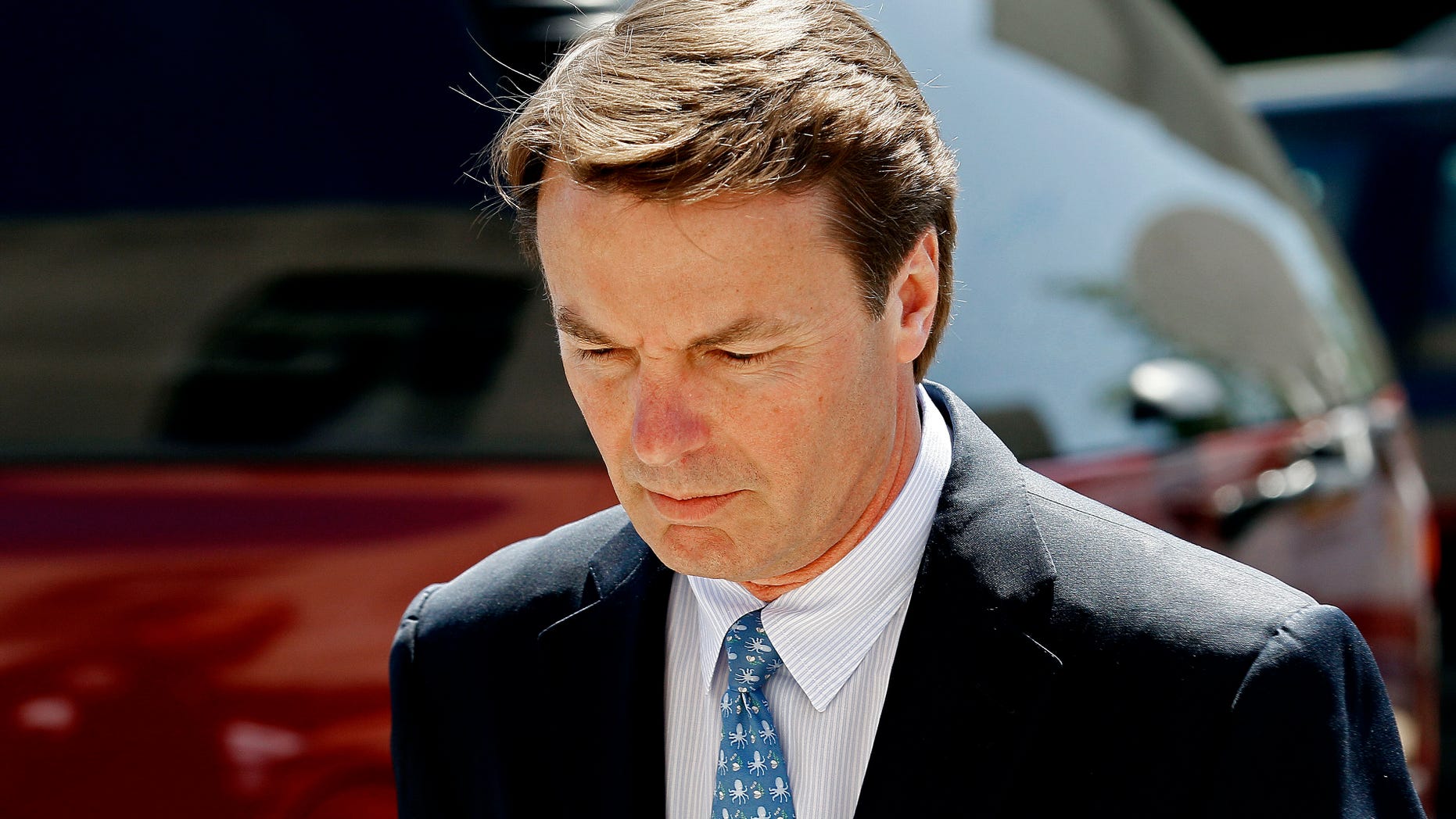 April 12: Former presidential candidate and U.S. Sen. John Edwards arrives outside federal court following a lunch break in Greensboro, N.C., where jury selection is underway in his criminal trial on alleged campaign finance violations.