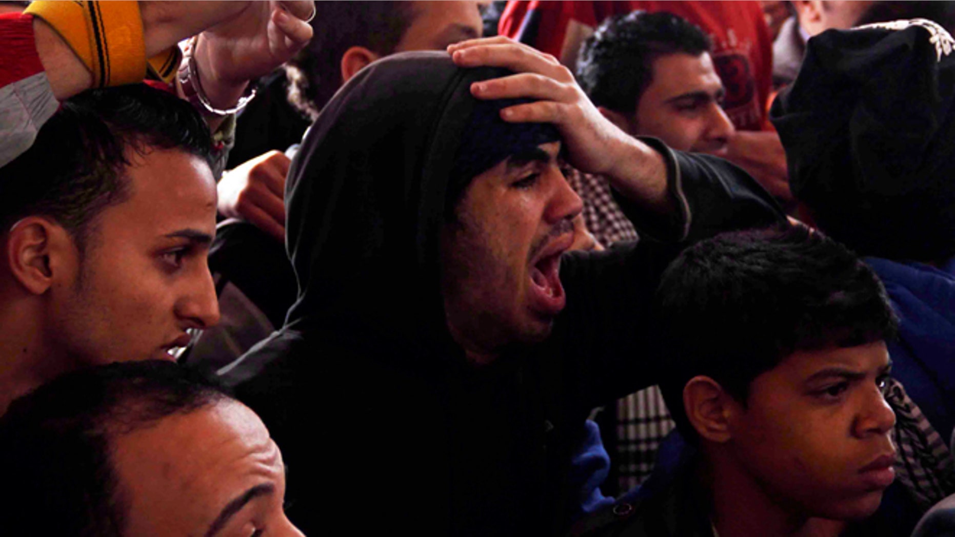 Jan. 26: Families and supporters of those accused of soccer violence from the Port Said soccer club react to the announcement of verdicts for 21 fans on trial in last years Port Said stadium incident which left 74 people dead, in Port Said, Egypt.
