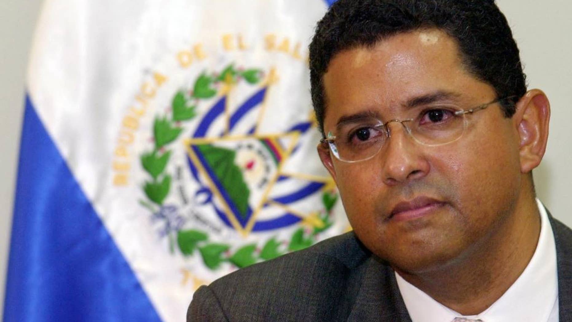 FILE - In this Jan. 13, 2005 file photo, former President of El Salvador Francisco Flores announces his candidacy for Secretary General of the Organization of American States (OAS) at the presidential house in San Salvador, El Salvador. El Salvador's top prosecutors are seeking on Wednesday, April 30, 2014 the arrest of Flores, who is accused of embezzlement, illegal enrichment and disobedience. (AP Photo/Luis Romero, File)