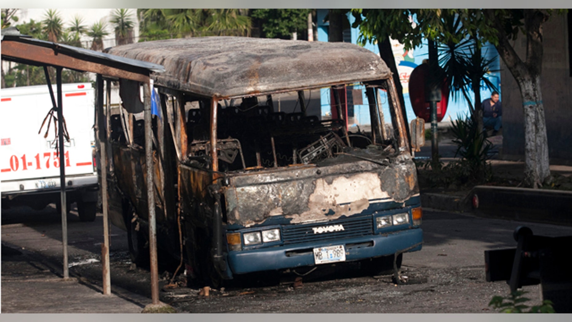 June 21: The bus was attacked Sunday night while driving along its regular route in the northern area of San Salvador, killing at least 10 people who were aboard and leaving several others badly hurt. (AP)