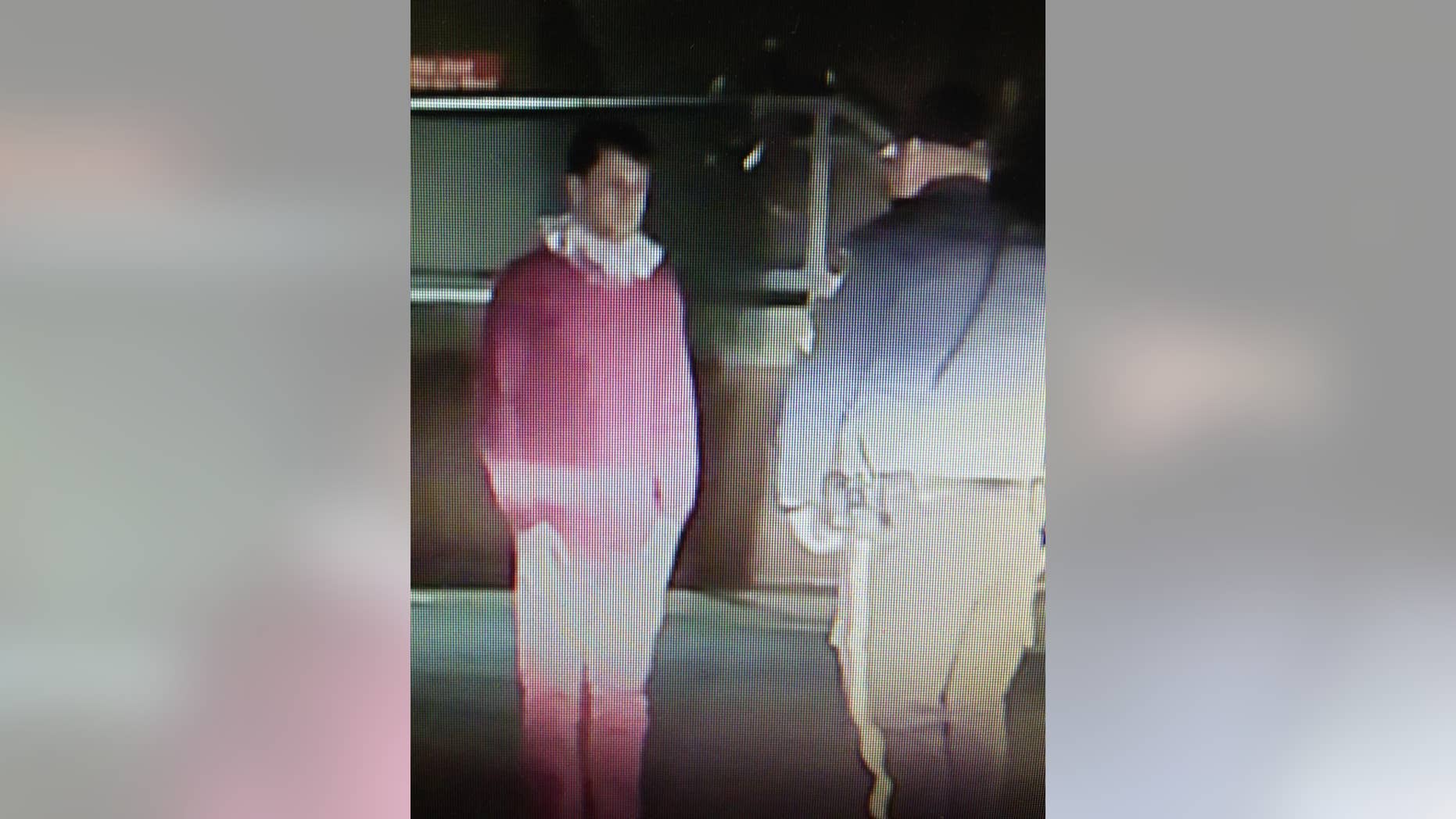 In this image taken from video and provided by the Riverdale, N.J. Police Department, Brian Chellis, 23, of Cedar Grove, N.J. talks with a Riverdale police officer after being found passed out in a car early Dec. 20, 2014. Police say that they found the man, who dressed as an elf, asleep behind the wheel of a van with its engine running, lights on and music blaring. Chellis, who faces drunk driving charges, was issued a summons and released to a family member. (AP Photo/Riverdale Police Department)